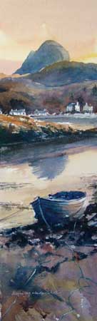 A moored boat lies under the shadow of the mountain of Suilven